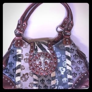 Gently used Fleur de Lis purse
